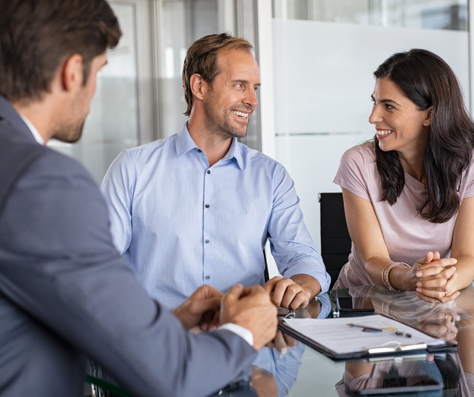 Clients meeting with an insurance agent
